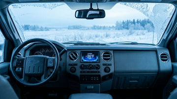 Pickup truck dashboard showing -20°F outside temperature in winter