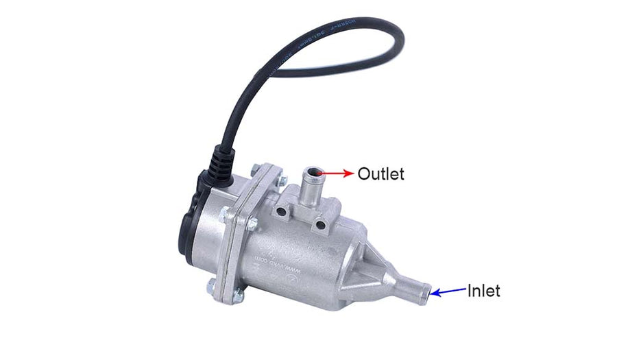 Titan-P6 inline coolant heater showing the inlet barb on the tapered end and the outlet barb on top