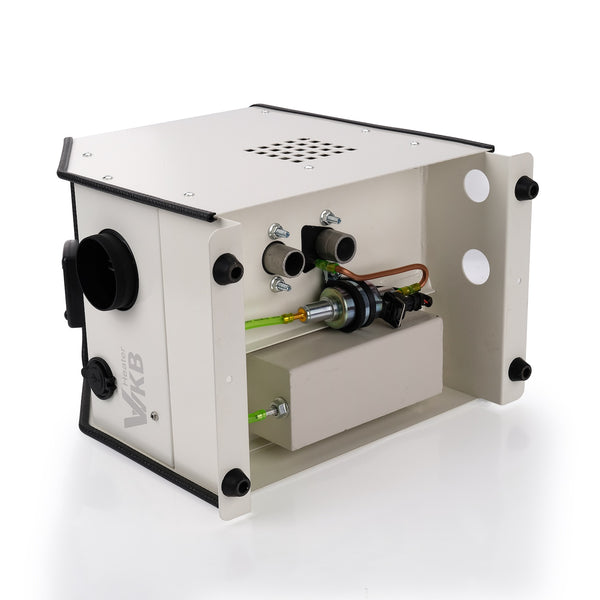 Inside the Vvkb portable diesel heater showing the metering fuel pump, fuel line and combustion air and exhaust ports