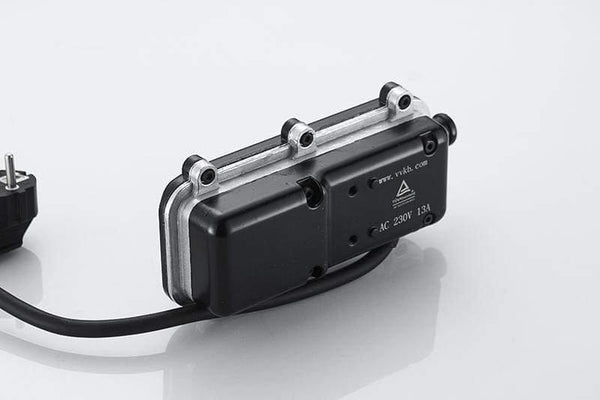 Titan-P3 engine block heater side profile showing 90° hose connection ports and cable routing
